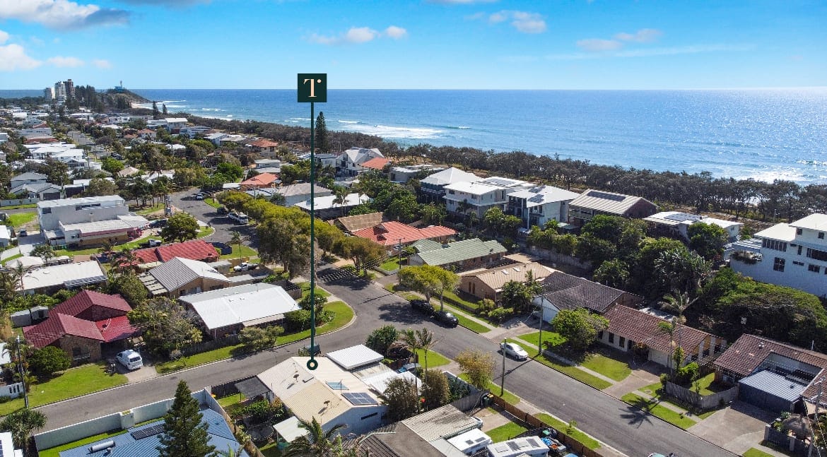Vast potential with seaside duplex on two titles.