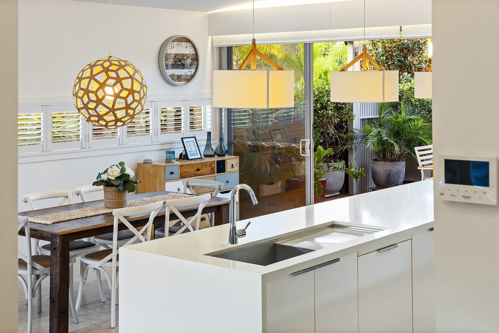 Immaculate Single Level Beachside Living in Private Enclave