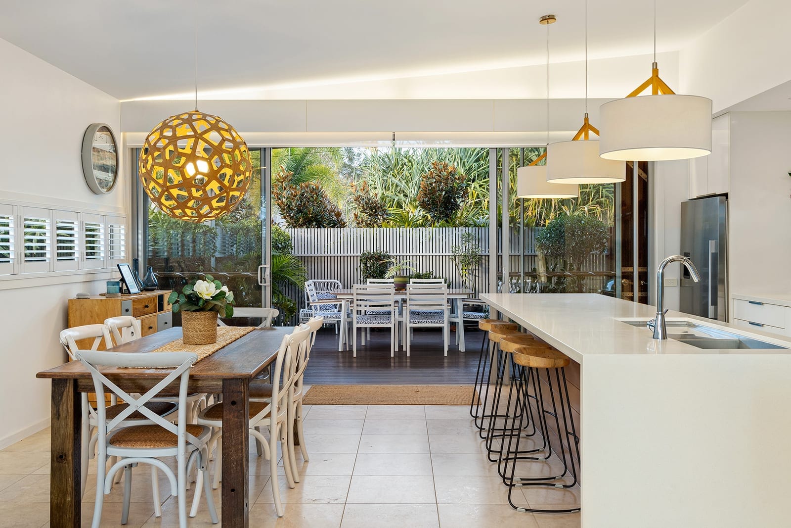 Immaculate Single Level Beachside Living in Private Enclave