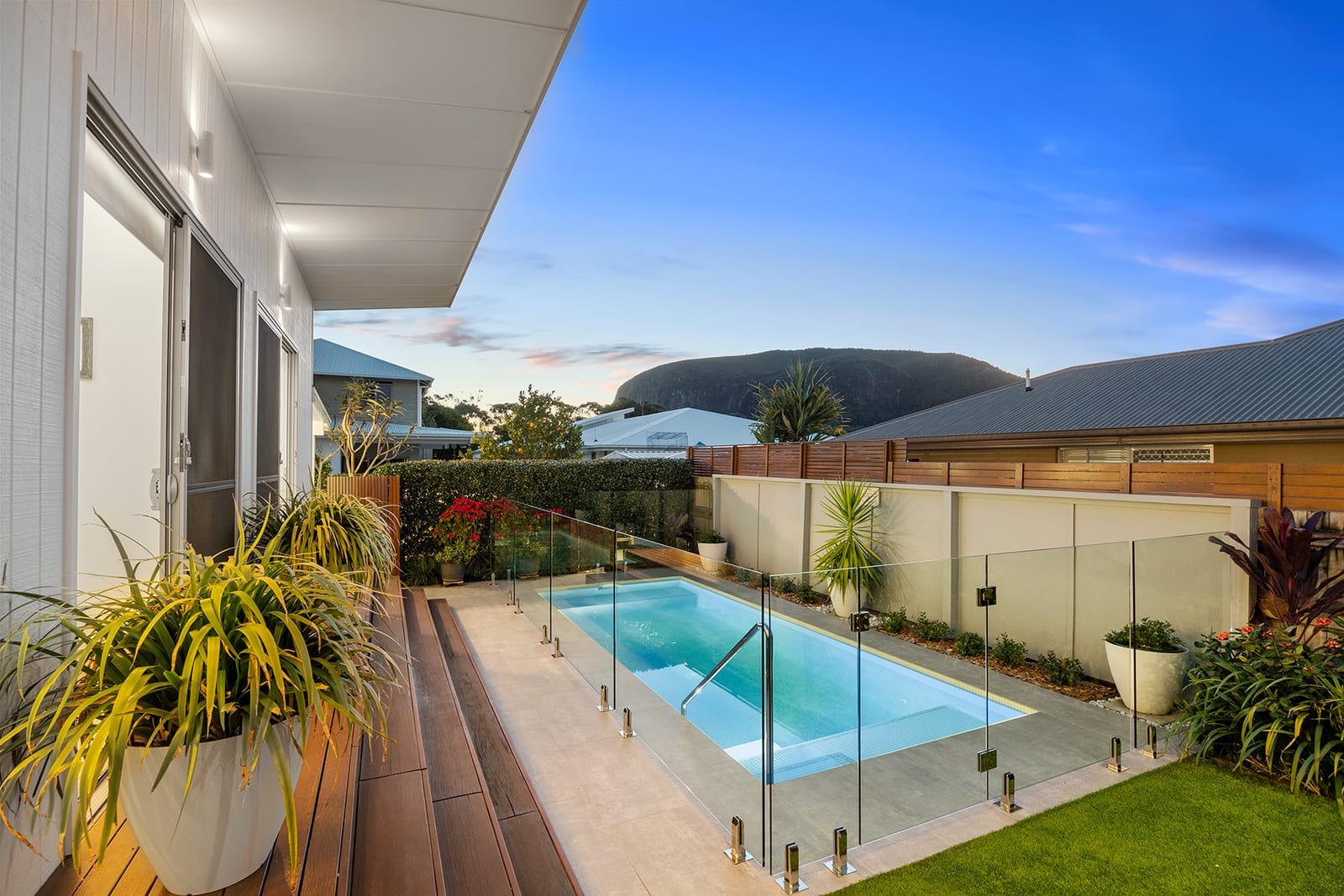 Immaculate Single Level Beachside Living in Private Enclave