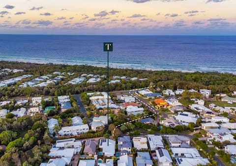 Immaculate Single Level Beachside Living in Private Enclave