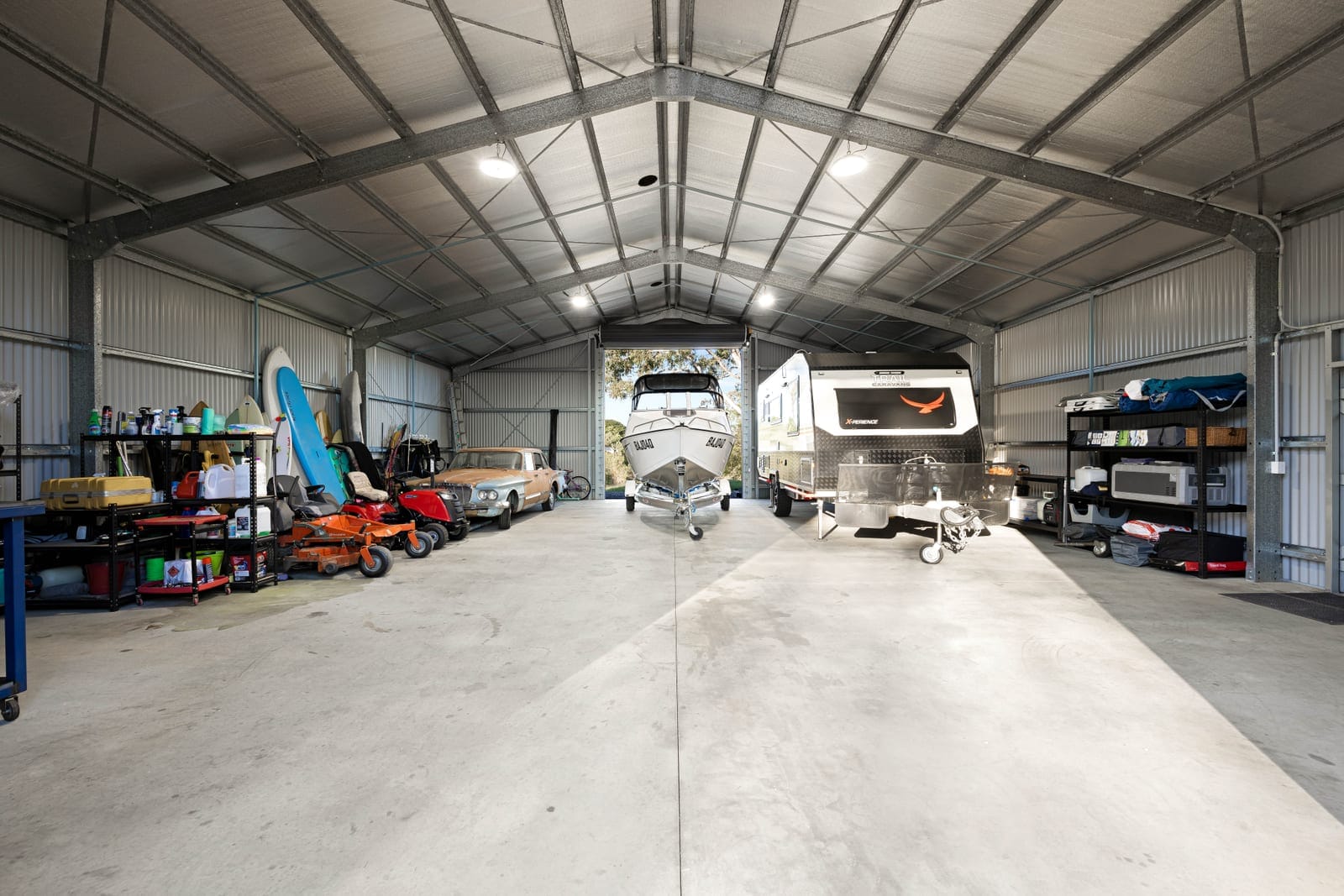 Single level, Executive acreage living with impressive shed!