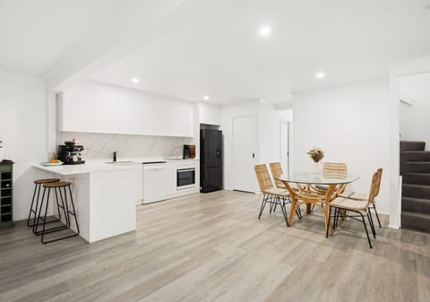 Stylish Coastal Duplex Boasting Modern Comfort And Convenience