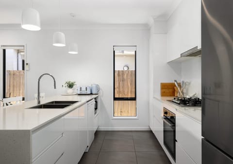 Stylish Family Home + SPA + Solar - Just Minutes from the Sand and Surf!