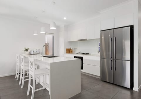 Stylish Family Home + SPA + Solar - Just Minutes from the Sand and Surf!