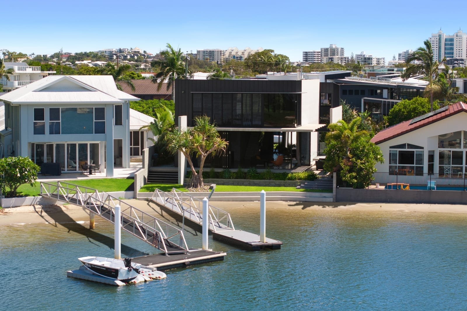 Luxe Riverfront Living: High-End Build, Deep Water Access