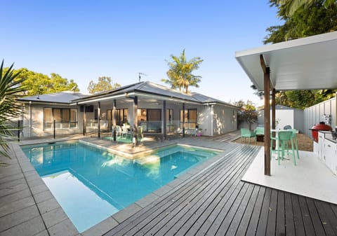 Contemporary Family Oasis with Reserve Backdrop