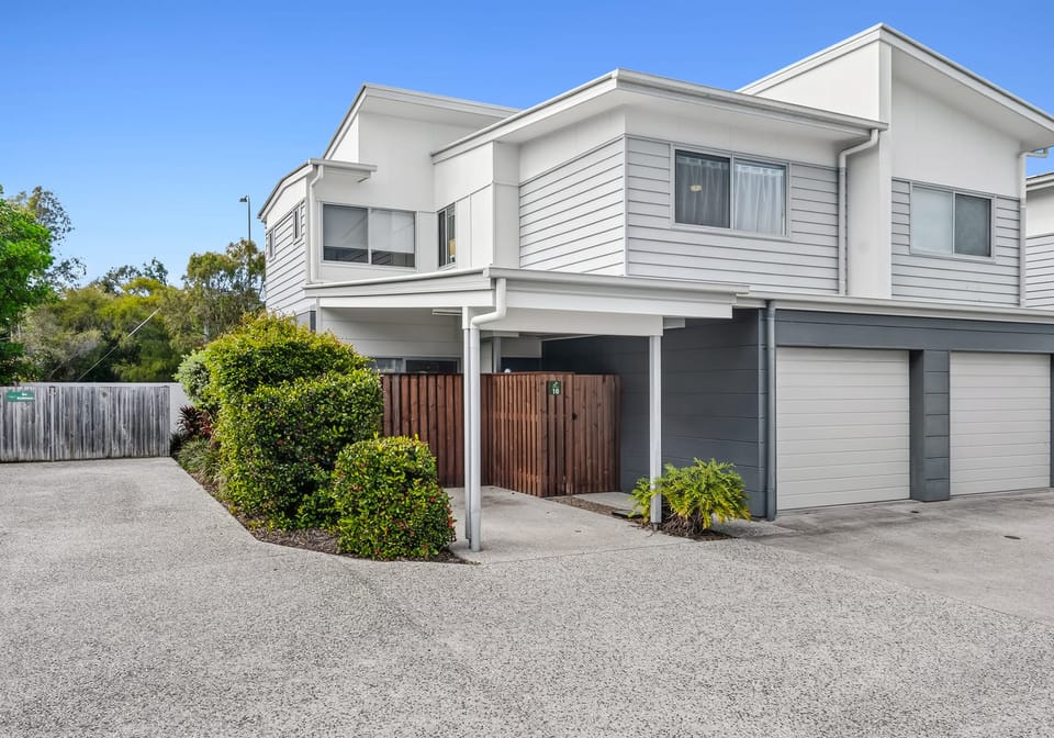 Low-Maintenance Living Minutes from Beaches & University
