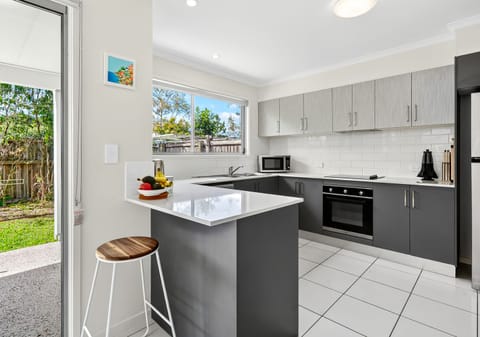 Low-Maintenance Living Minutes from Beaches & University