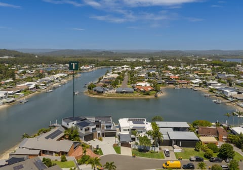 Luxury Riverfront Living: Brand New Contemporary Masterpiece