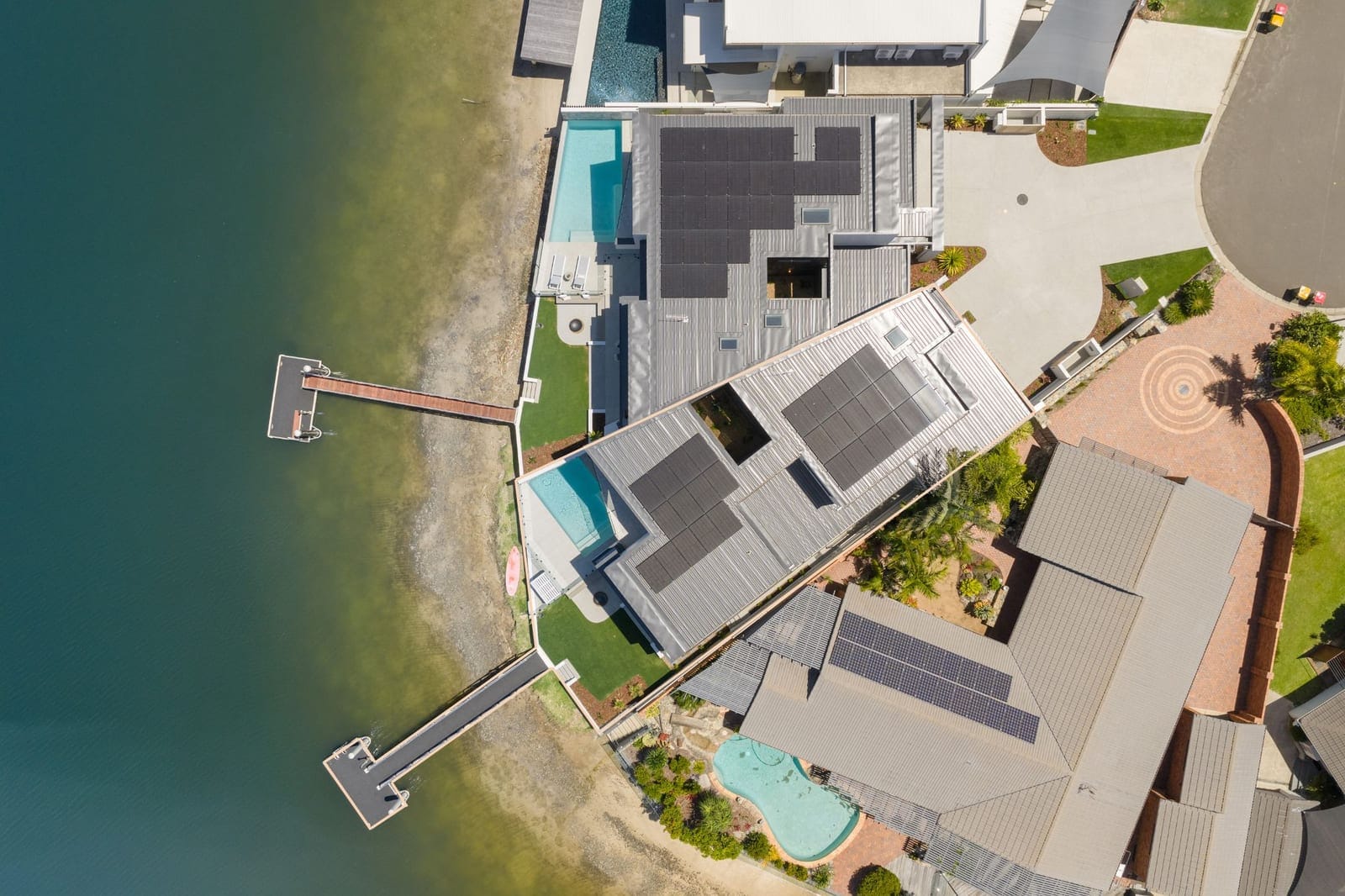 Luxury Riverfront Living: Brand New Contemporary Masterpiece