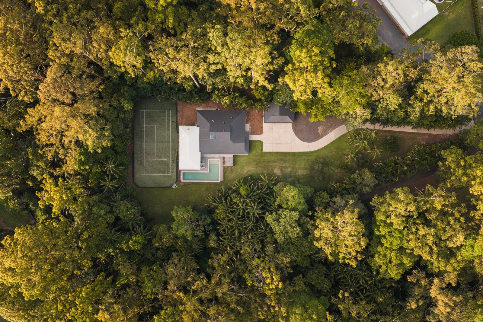 A Secluded Rainforest Estate Designed for Refined Family Living