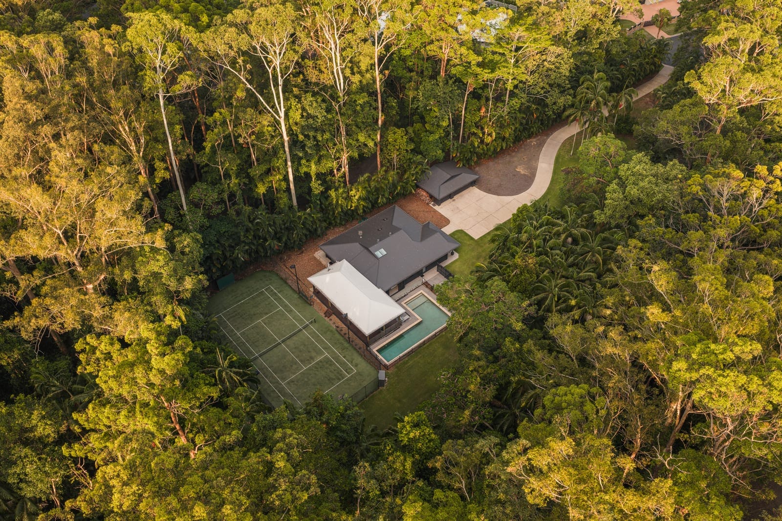 A Secluded Rainforest Estate Designed for Refined Family Living