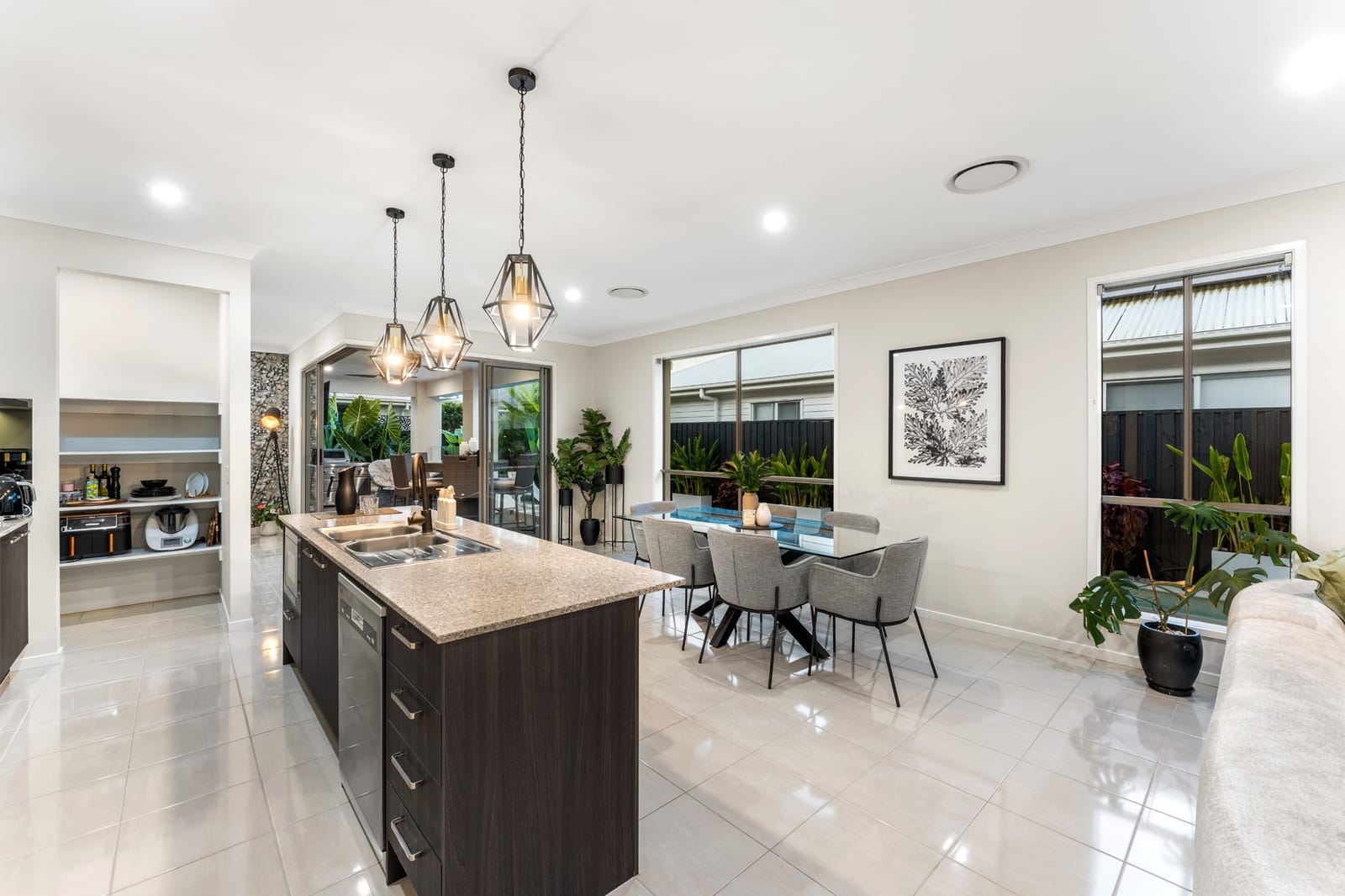 SOLD BY JAMIE VIBERT & NAJ ELSAYED