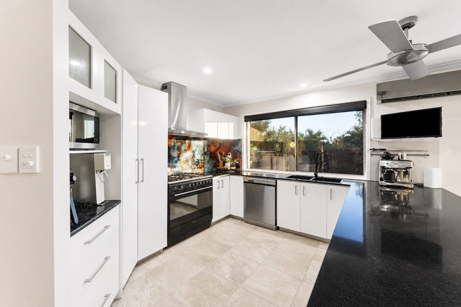 SOLD BY JAMIE VIBERT & NAJ ELSAYED