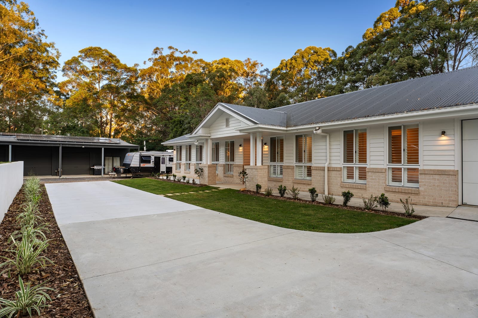 Acreage Living Redefined - Near-New Dual Living on 3.8 Acres