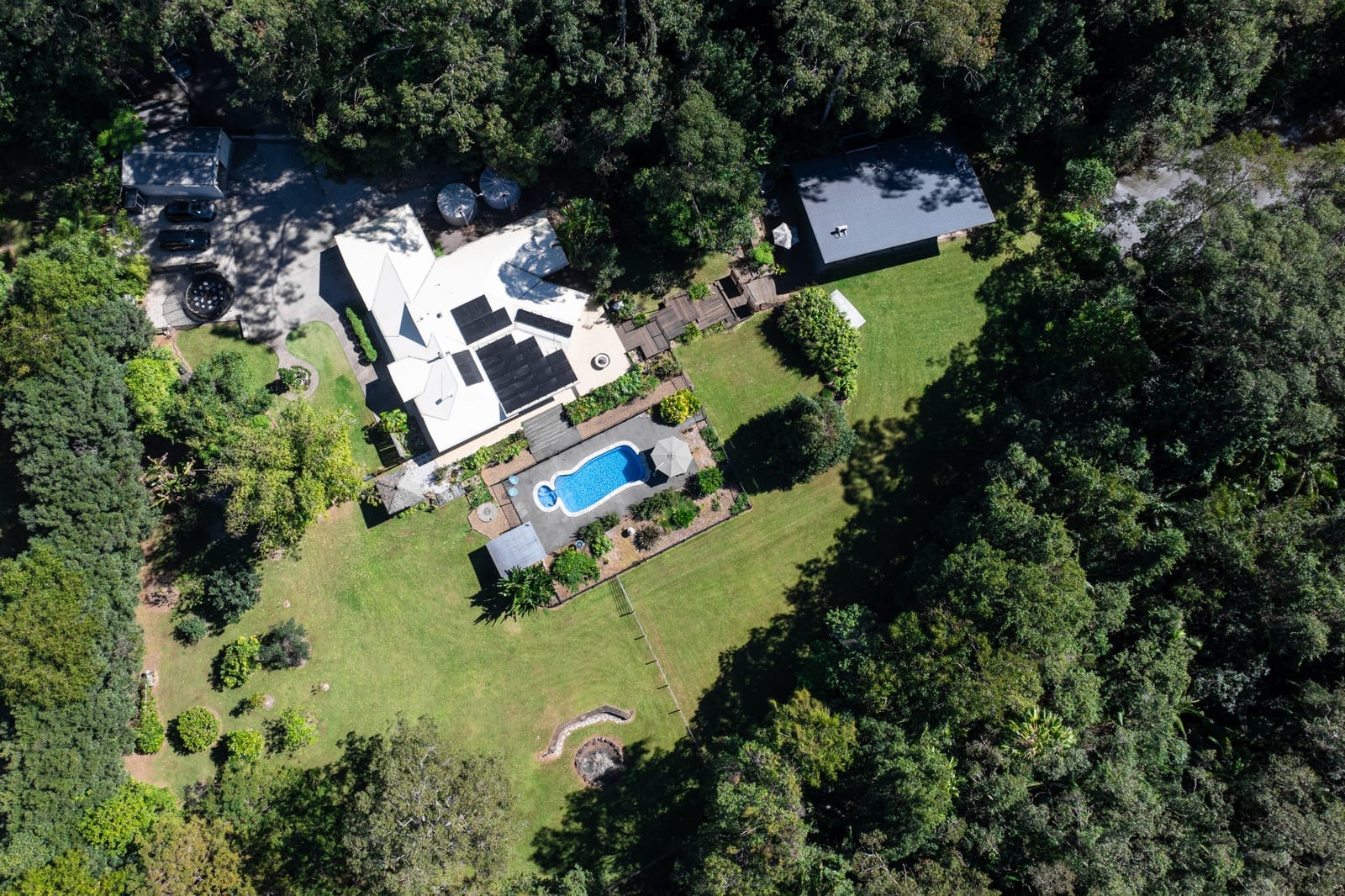 PRIVATE ACREAGE, DUAL LIVING & AN ENVIABLE PALMWOODS LIFESTYLE