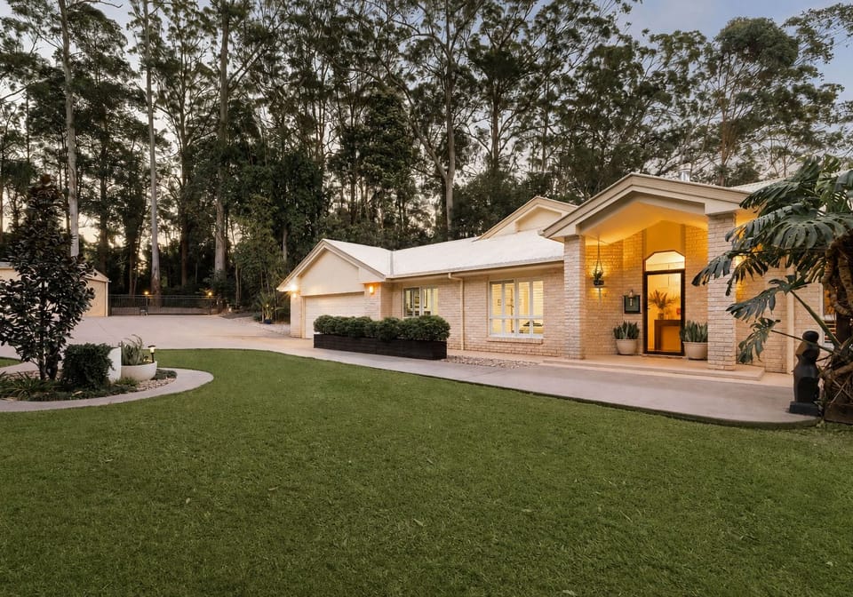 PRIVATE ACREAGE, DUAL LIVING & AN ENVIABLE PALMWOODS LIFESTYLE
