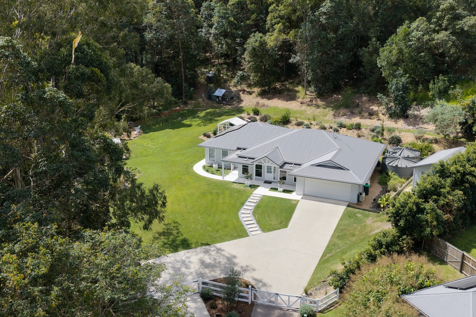 Hamptons Charm Surrounded by Beautifully Landscaped Grounds