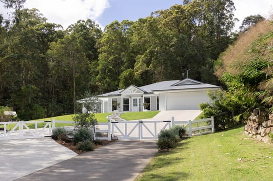 Hamptons Charm Surrounded by Beautifully Landscaped Grounds