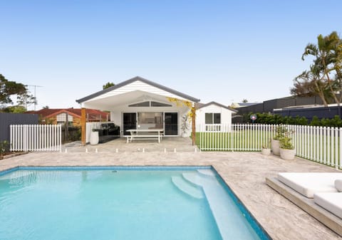 North-Facing Entertaining, Poolside Living & Room for All the Toys!