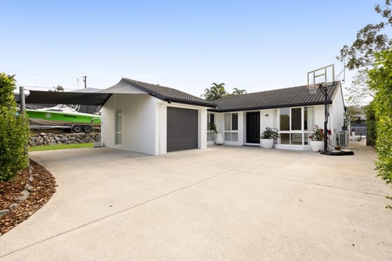 North-Facing Entertaining, Poolside Living & Room for All the Toys!