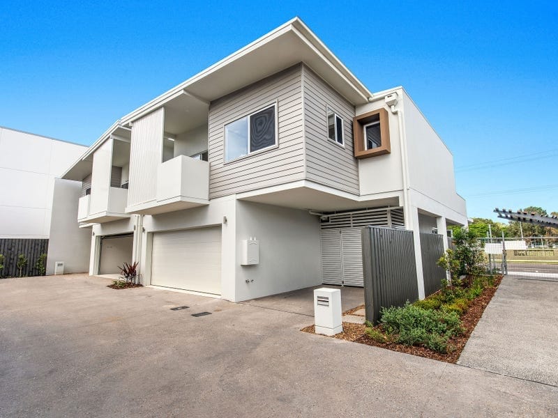 Brand New, High-End Beachside Living!
