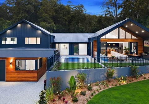 EXCLUSIVE BRAND NEW FAMILY HOME NESTLED AMONGST PRIVATE BUSHLAND SETTING