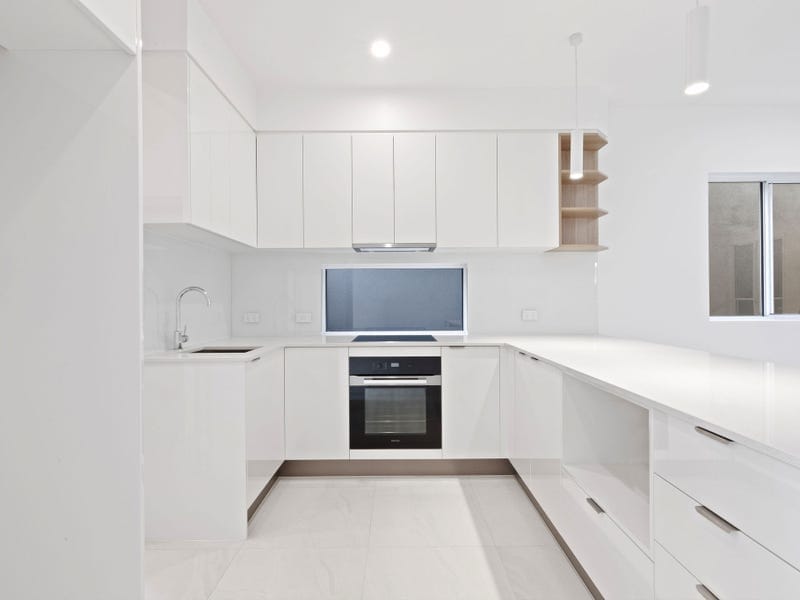 Brand New, High-End Beachside Living!