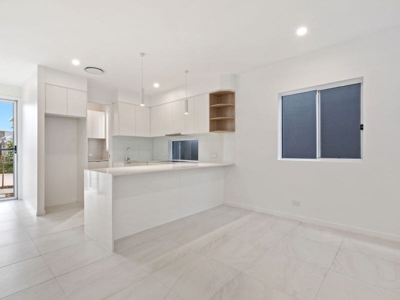 Brand New, High-End Beachside Living!